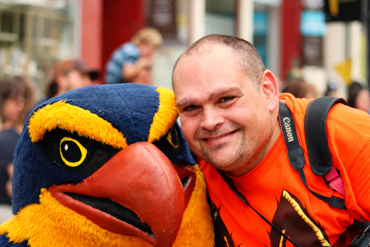 Thunderbird mascot and photographer at the 2026 Baraboo Homecoming Parade