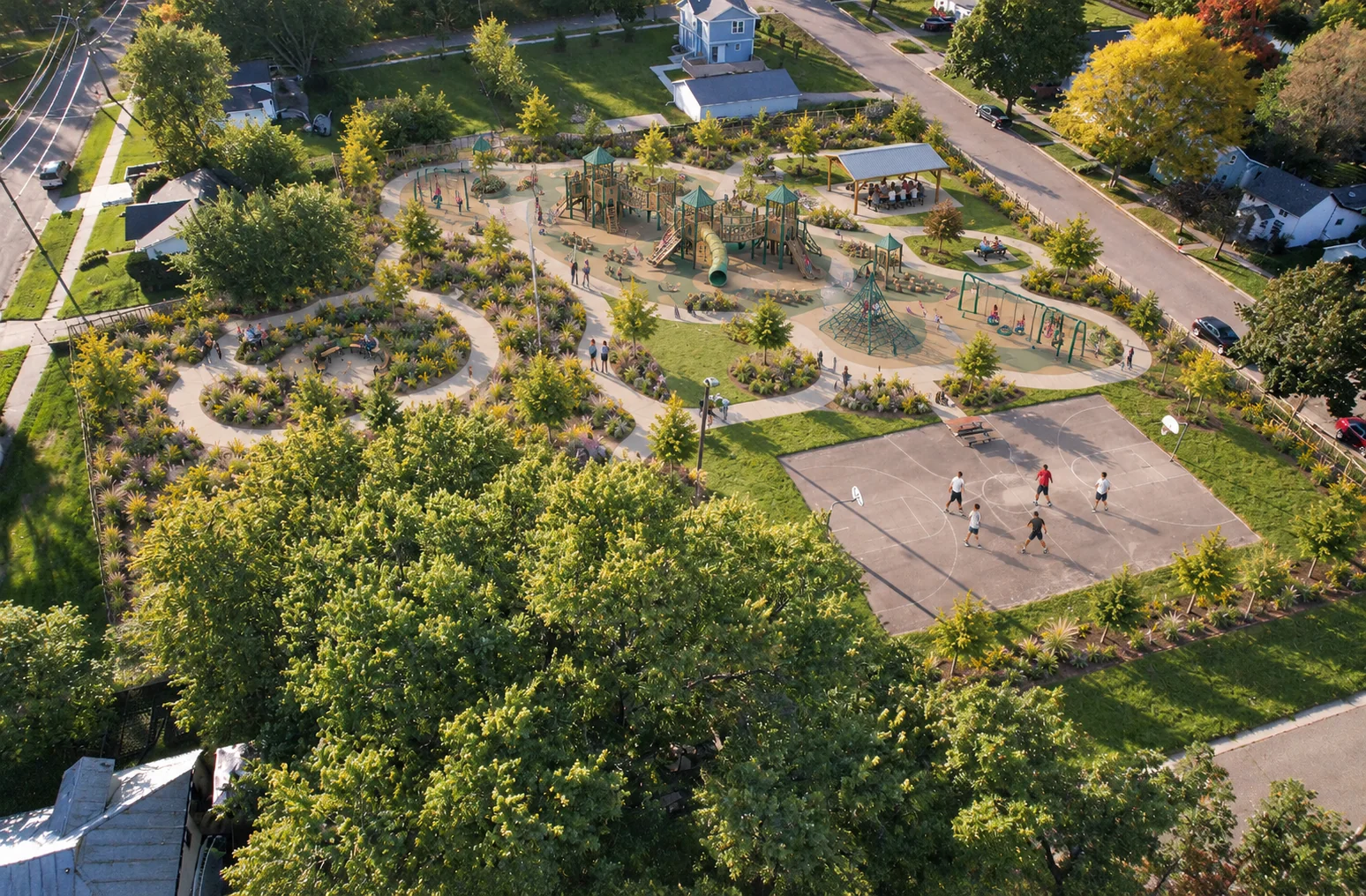 AI-assisted weber park concept visualization: garden paths, playground, and the existing basketball court