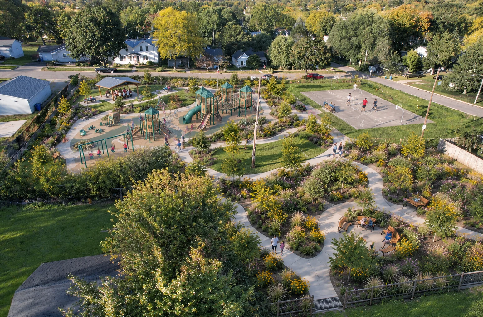 AI-assisted weber park concept visualization: neighborhood view of the playground and gardens